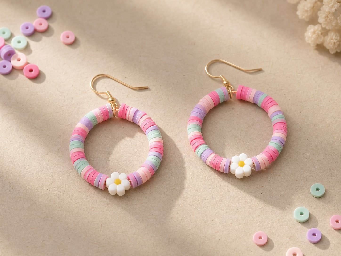 Pastel clay-bead hoop earrings with daisy beads